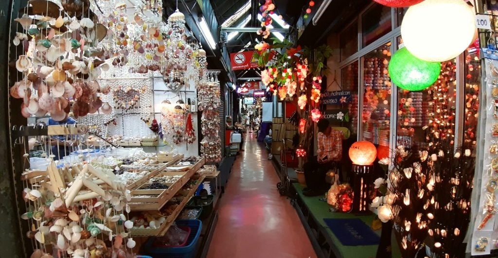 A narrow street among small shops